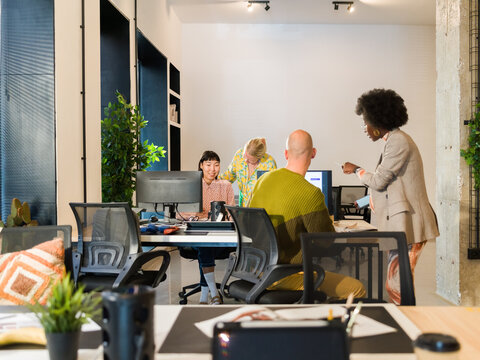 Team Collaboration in a Modern Office Space During the Day