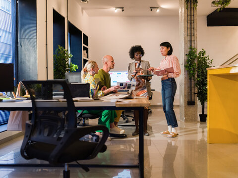 Team Meeting in a Modern Office Discussing a Project Together