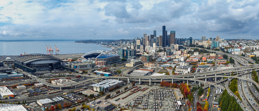 Seattle city skyline panorama showing stadiums and highway interchange