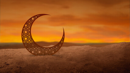 An intricate laser-cut metal crescent moon stands on desert sand against a beautiful orange sunset sky. Perfect for Ramadan, Eid al-Fitr, and Islamic greeting cards © Leo Lintang