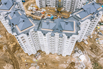 construction site with construction machines, equipment and materials. aerial view.