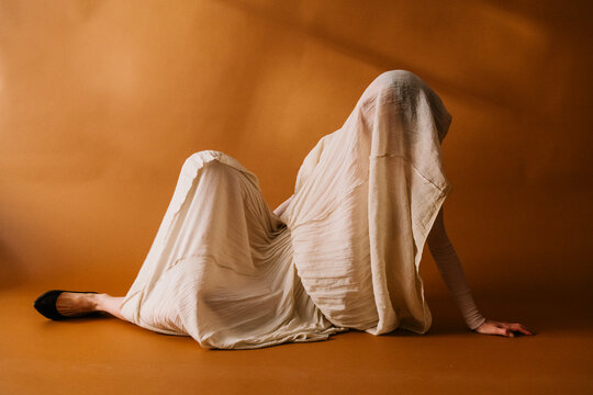 Draped Figure Seated on Floor, Back View