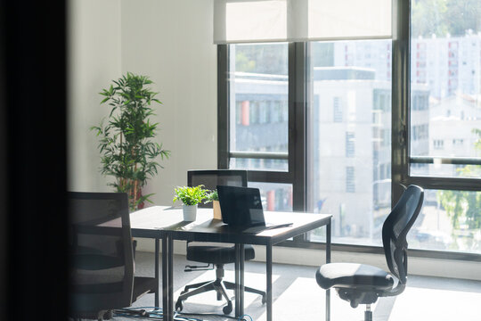 Cozy Office Workspace With Natural Light in Modern Building