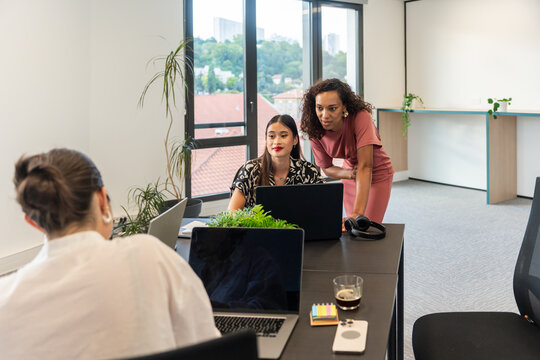 Team Collaboration in a Modern Office Setting During Daylight Hours