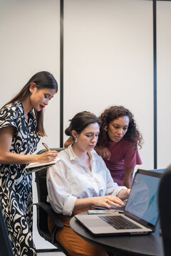 Team Collaboration in Modern Office During Important Project Meeting