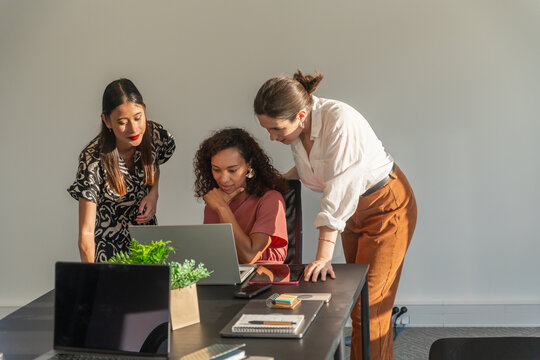 Team Collaboration in a Bright Office Space During the Day