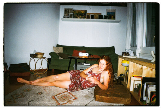 Relaxing woman indoors