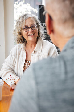 Smiling older woman having a conversation