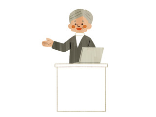 教卓に立って説明をする男性-ガッシュ