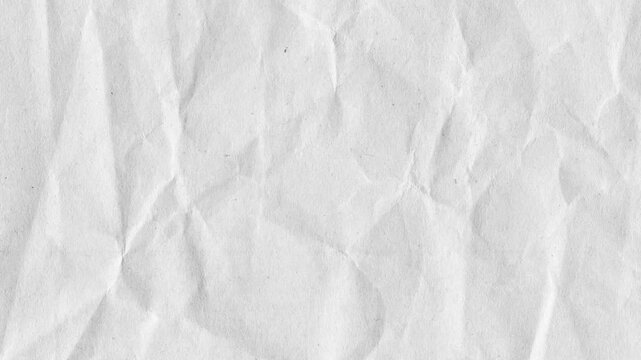 Abstract Crumpled Paper Transition,Animated stop motion of wrinkled white paper unfolding on a black background. A creative, textured reveal for intros or overlays.Video 4k