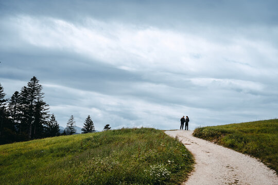 Father and son hiking in the Dolomites
