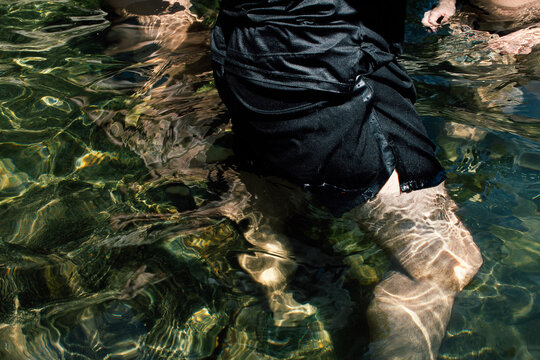 Water Splashes and Reflections in a Serene Outdoor Setting