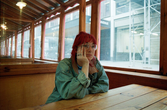 Red haired woman waiting
