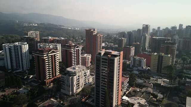 Aerial of zona 14 in downtown Guatemala City with white smoggy sky