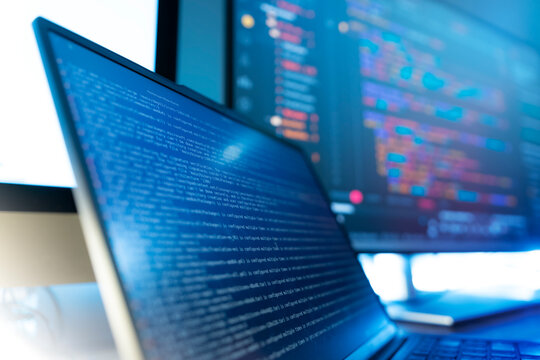 Programer studio. coding on laptop and develop software, websites, or applications using programming languages ​ Python, JavaScript, Java, and C++ to Test to ensure the system works efficiently.