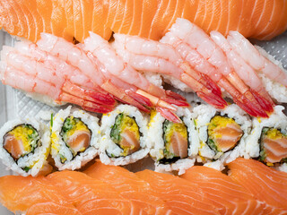 Different types of sushi on a plate © mnimage
