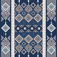 Seamless geometric tribal pattern with diamond shapes and ethnic ornaments in navy blue and beige tones. Decorative vector design for textile, wallpaper, background, and print.