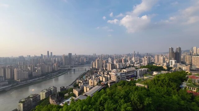 Timelapse cityscape of Chongqing China with dramatic clouds moving rapidly above dense urban skyline. Dynamic megacity atmosphere and architectural growth in southwestern China.