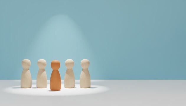 leadership, standing out, individuality, spotlight, team, unique, recruitment, representing business success, talent acquisition, and human resources concepts with wooden figures.