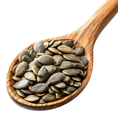 Obraz premium Pumpkin seeds in a wooden spoon isolated on white background