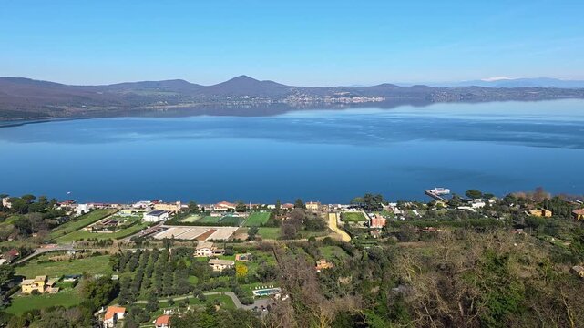 Panoramic aerial view of Lake Bolsena seen from the ancient Bracciano Castle in Lazio, Italy