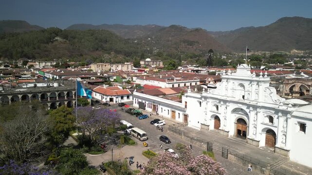 Aerial historic Catholic parish Catedral San Jose and Parque Central in Antigua Guatemala