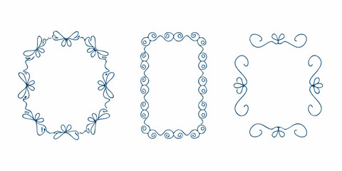 Obraz premium Delicate blue ornamental frames and flourishes in a vintage style