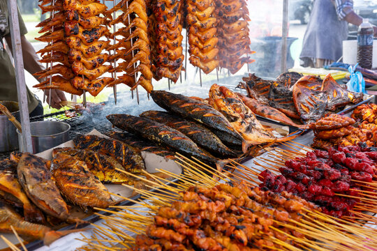 Grilled and barbecue fish and chicken wing and satay during Ramadan bazaar in Kota Kinabalu