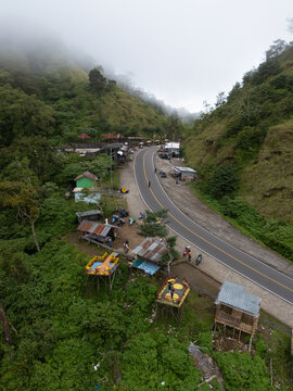 Road in the mountains in Indonesia with low cloud cover 