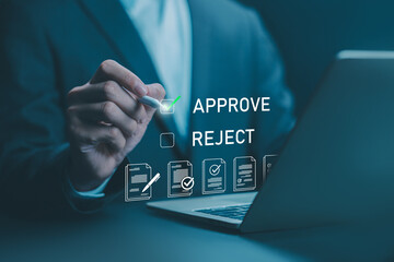 Businessman approving digital documents on a laptop, electronic contract. Business authorization...