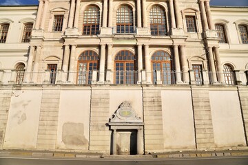 Neoclassical Building Front with Ornate Reliefs, Historic Facade withStone Carvings 