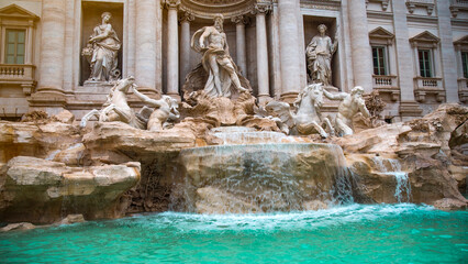 Majestic Trevi Fountain with turquoise water and marble sculptures, Rome, Italy © Aliaksei