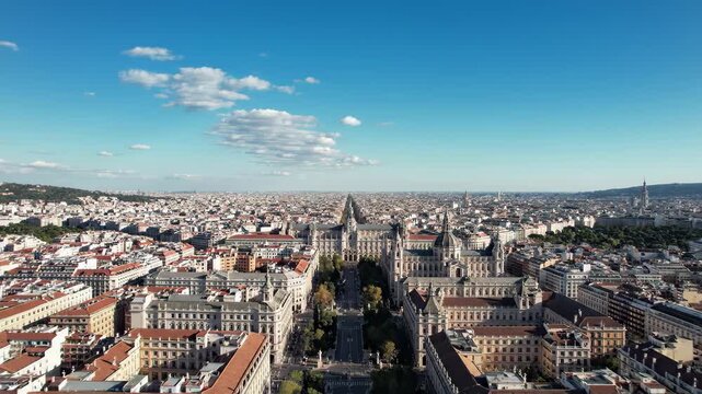 Aerial view of budapest cityscape with andrssy avenue and historic architecture under a bright blue sky