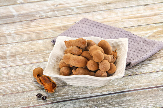 Tropical exotic Tamarind fruit heap