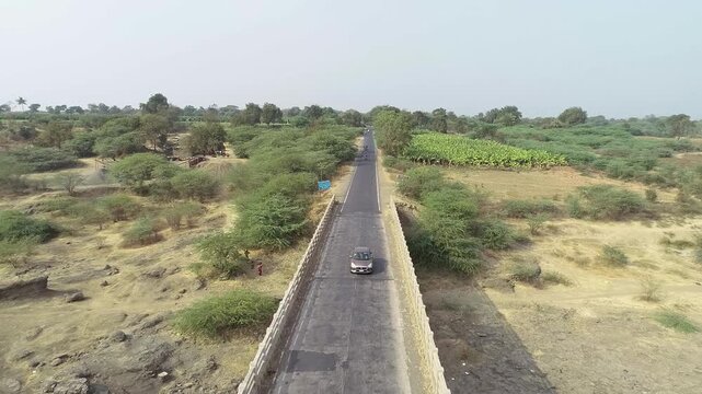Big bridge on river with some vehicle run 