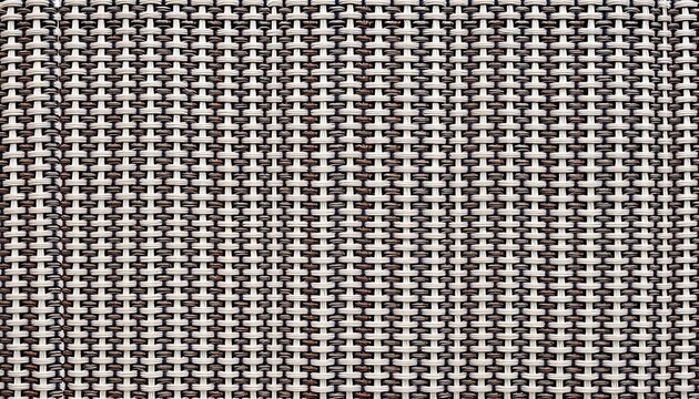 Intricate woven fabric with a repeating geometric design, showcasing a tactile surface, visual, detail