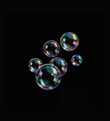 Glossy Air Bubbles in Multicolor Reflection on Dark Background