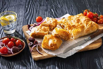 Greek savory sliced meat bougatsa pie with olives