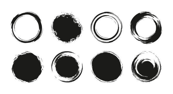 A collection of eight black ink brush stroke circles and abstract shapes on a white background.