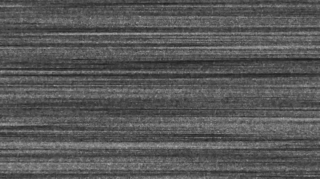 A strikingly abstract grayscale image depicts numerous horizontal lines creating a textured layered effect reminiscent of weathered wood or fabric high quality