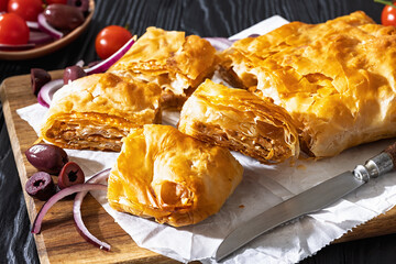 Greek savory sliced meat bougatsa pie with olives
