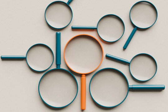 Magnifying glasses representing finding solutions, research, focus, exploration, detailed investigation, and discovery