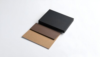 Stack of black cards with brown and tan cards isolated on white background