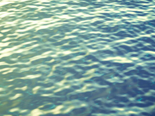 Fototapeta premium Teal and gold sunlit water ripples with soft morning light effects