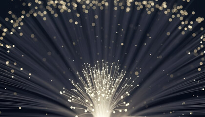 Glowing fiber optic bundle spreads bright ethereal light beams upward against a dark background