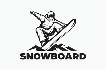 Silhouette shows helmeted snowboarder carving through snow above mountain peaks in monochrome