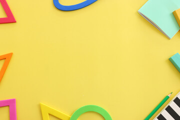 yellow background with colorful geometrical shapes