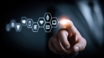 Fototapeta premium Professional hand interacting with digital icons representing technology, communication, data, and connectivity in a modern business environment