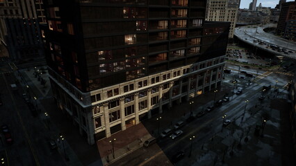 As twilight settles, a modern building stands tall against the dimming sky. © icetray