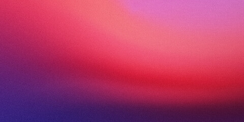 Fototapeta premium A vibrant gradient of colors transitioning from purple to pink and red.